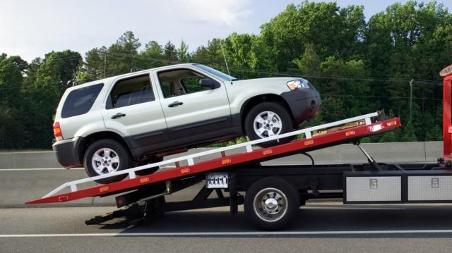 Car Towed on the Road